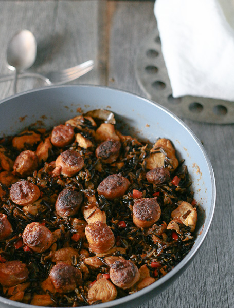 Delicious and easy-to-make Paleo Paella! Made with wild rice, chorizo, and saffron, this aromatic dish is sure to please!