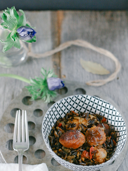 Delicious and easy-to-make Paleo Paella! Made with wild rice, chorizo, and saffron, this aromatic dish is sure to please!