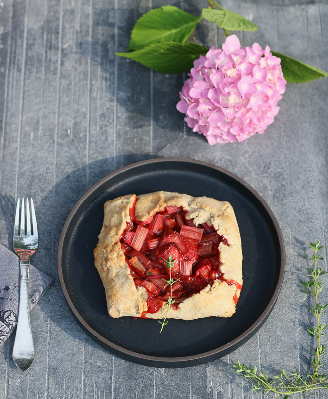 Fresh off-the-farm strawberries, and garden-fresh rhubarb and thyme wrapped in a Paleo-ish pâte brisée-ish crust!  The perfect dessert to end the perfect summer night!